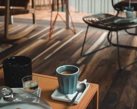 blue ceramic mug on table